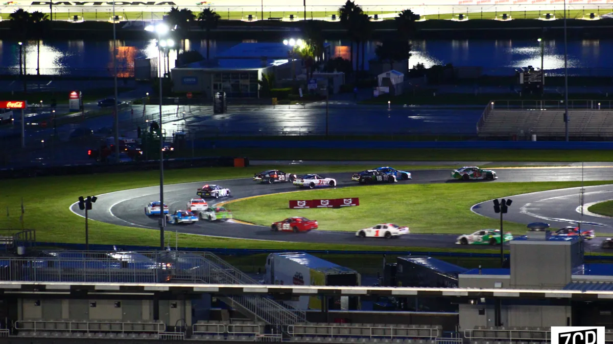 Stock Car Navigating Infield Road Course Curbs Cup Series race car hopping transition curbs in the tight infield complex