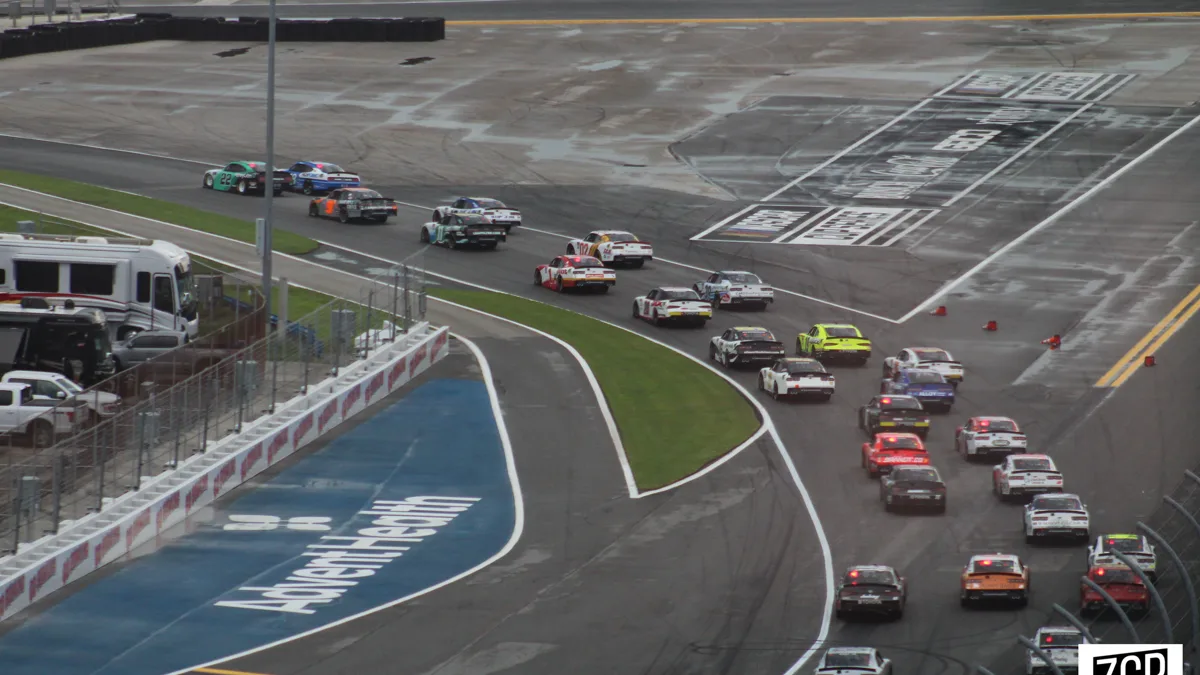NASCAR Cup Series Pack Braking Into Road Course Chicane NASCAR Cup Series field under heavy deceleration entering road course chicane