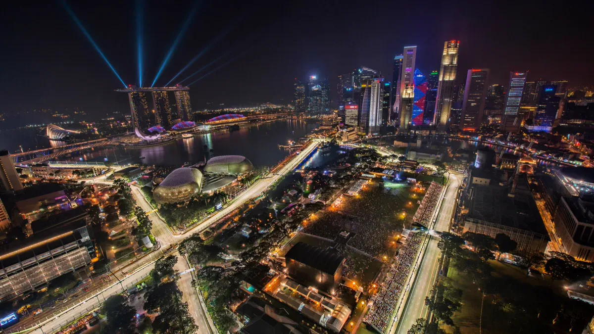 Singapore Marina Bay Street Circuit illuminated track where F1 cockpit heat reaches extreme levels