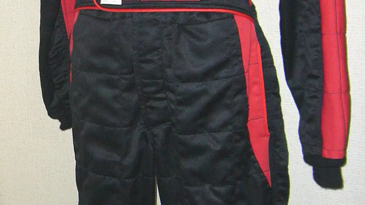 Full-length race car driver costume suit displaying zipper, collar, and sponsor patch layout